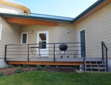 Exterior porch with custom steel handrail